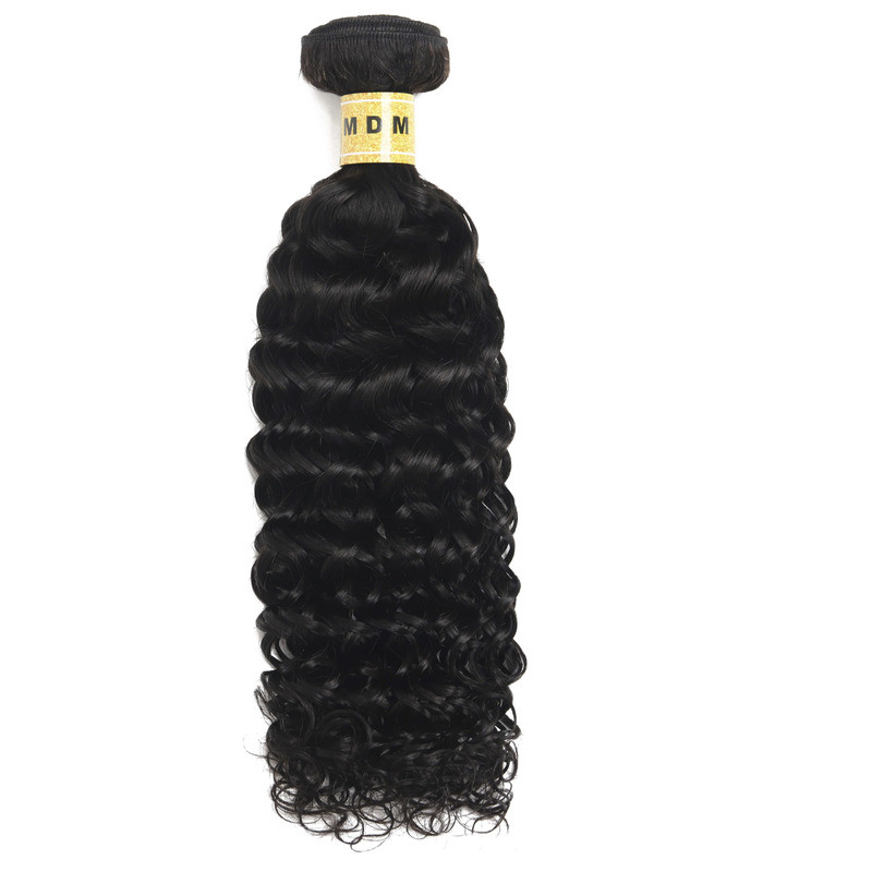 Tissage Exotic Curly - Boucles Lâches et Naturelles